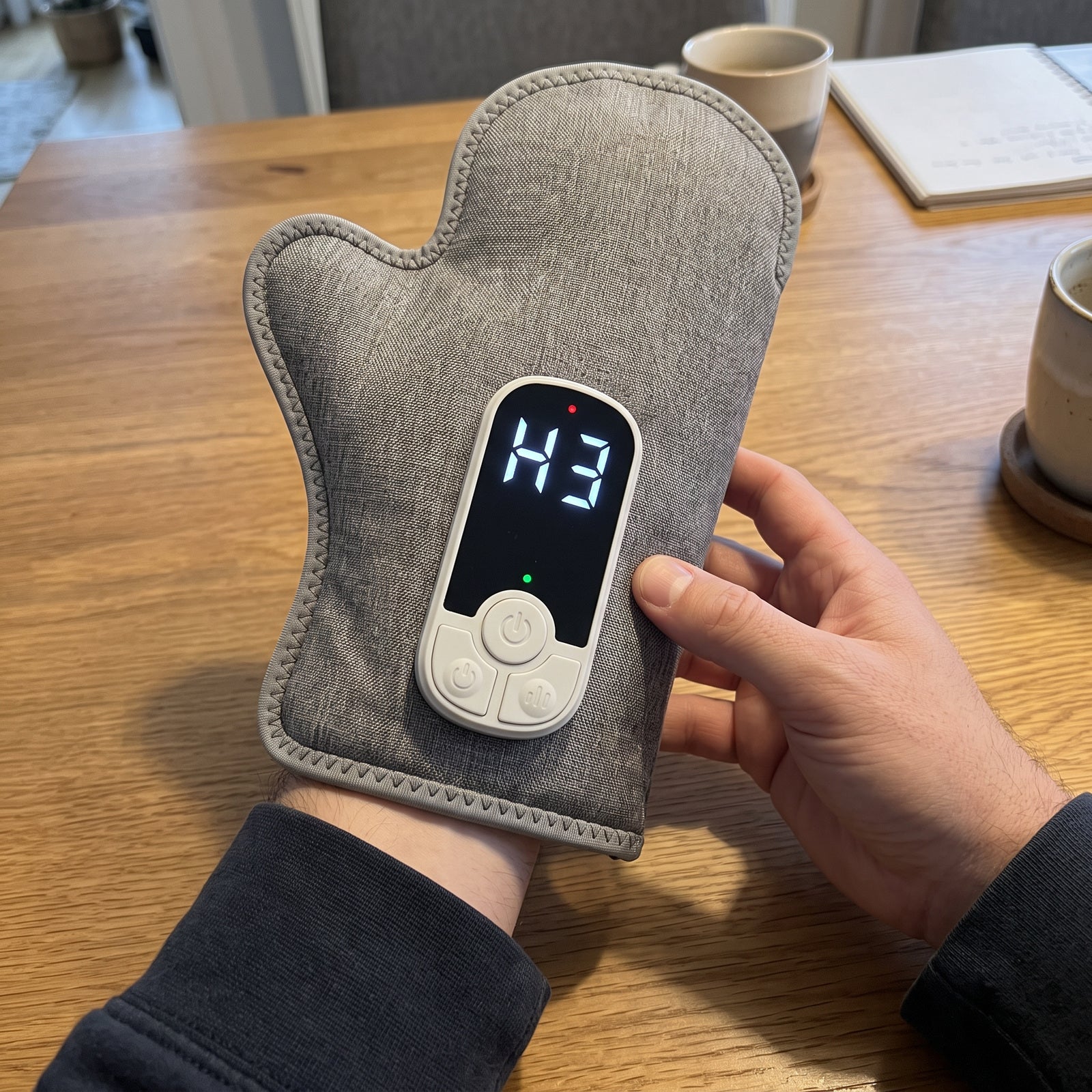 Hand touching Palmhaven woven edging beside its attached controller